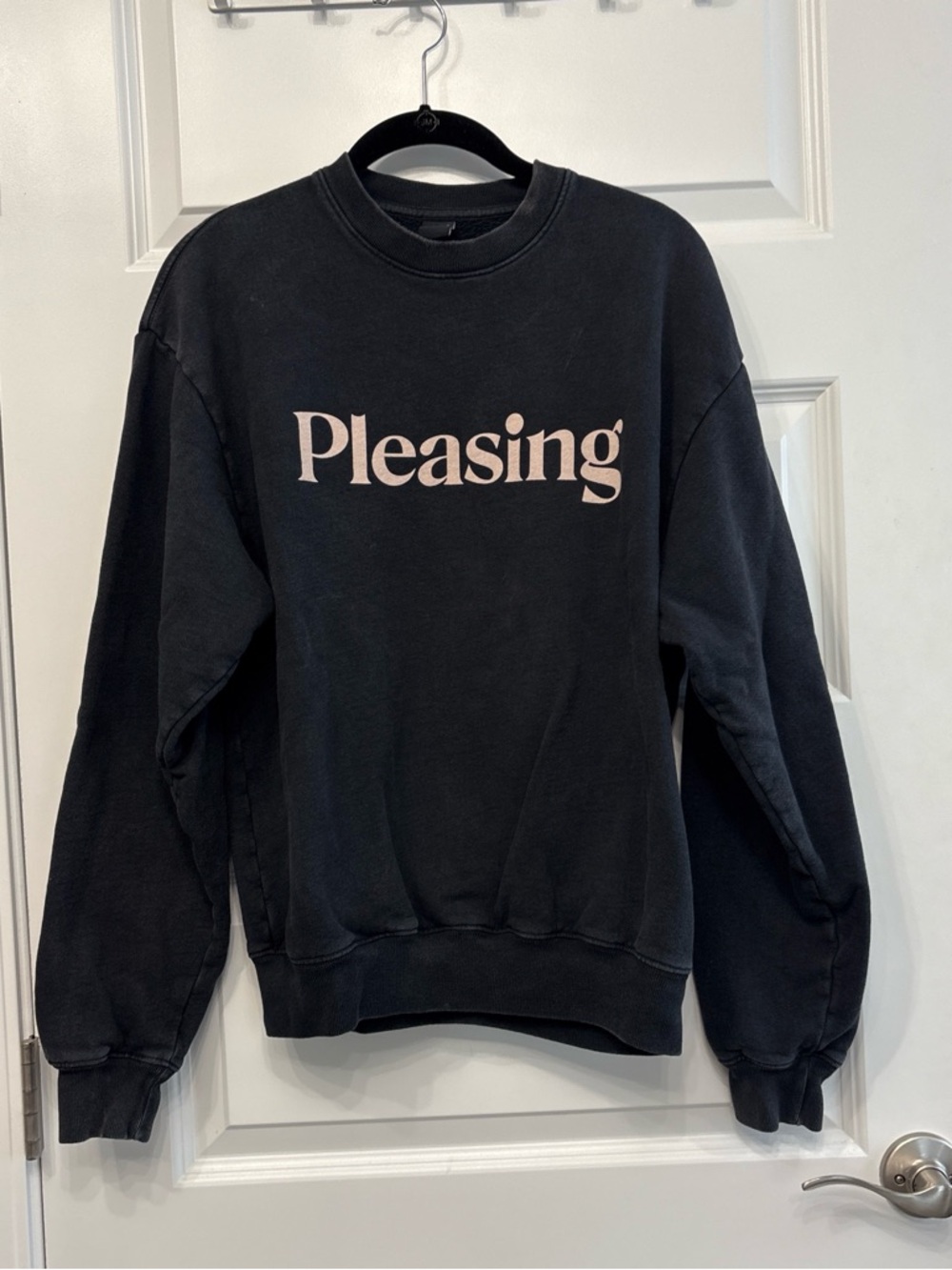 Pleasing Black Crewneck Sweatshirt with Tan Logo Unisex
